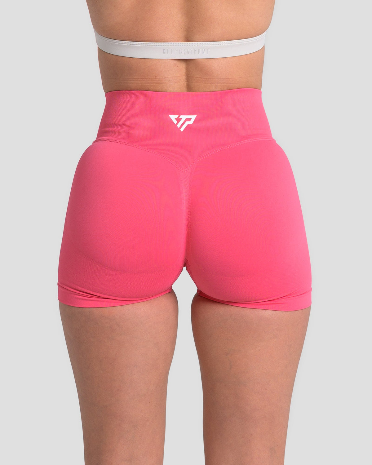 RECOIL HIGH WAIST SCRUNCH SHORTS - DARK CORAL