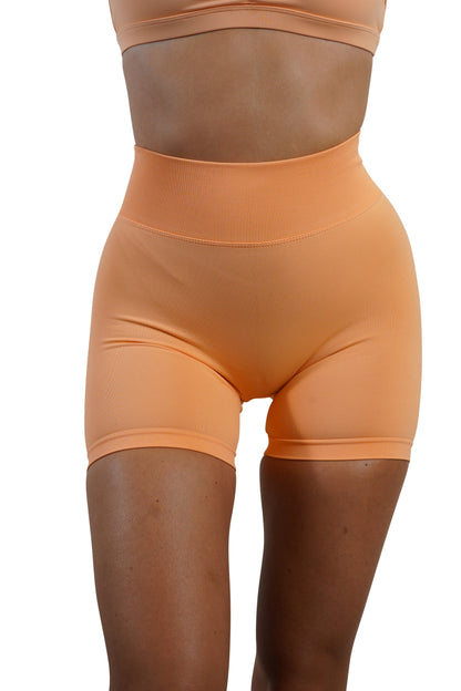 CORE SCRUNCH SHORTS - SHERBET ORANGE