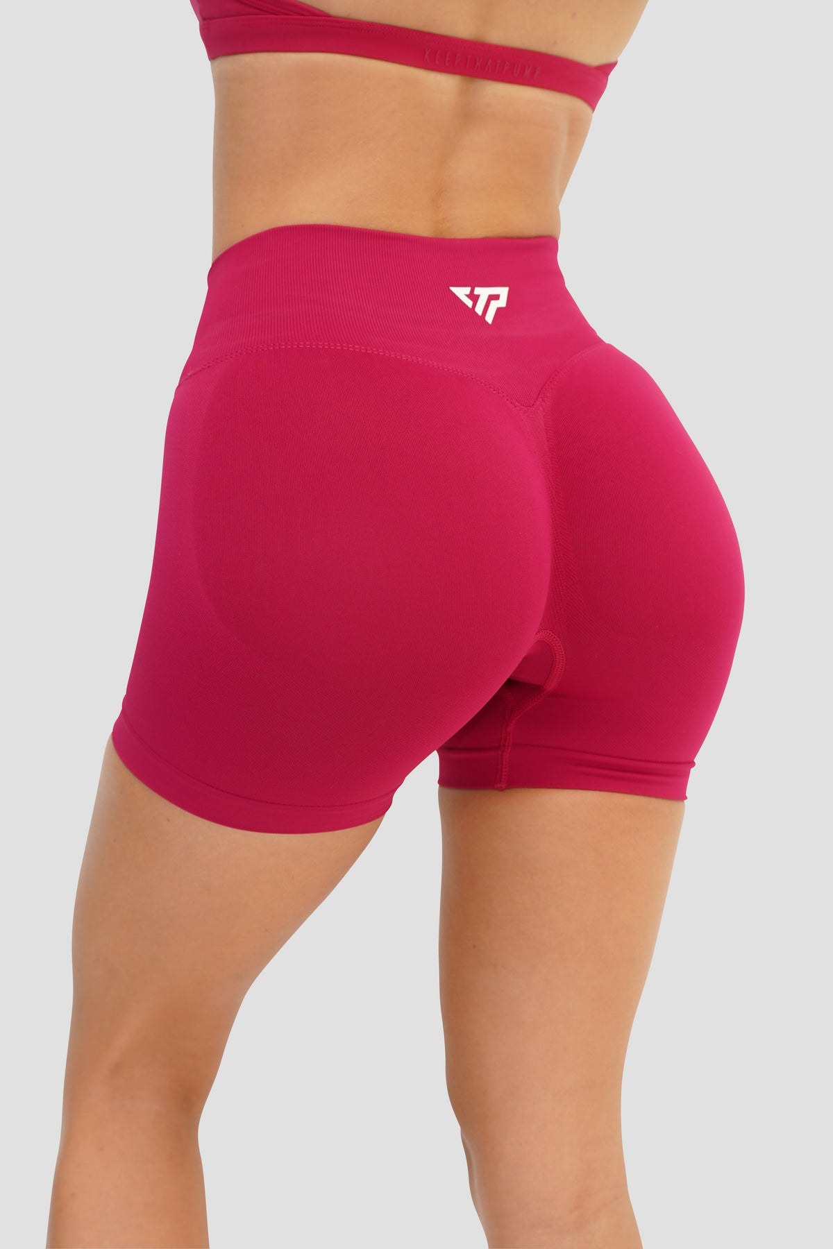 RECOIL HIGH WAIST SCRUNCH SHORTS - CRANBERRY