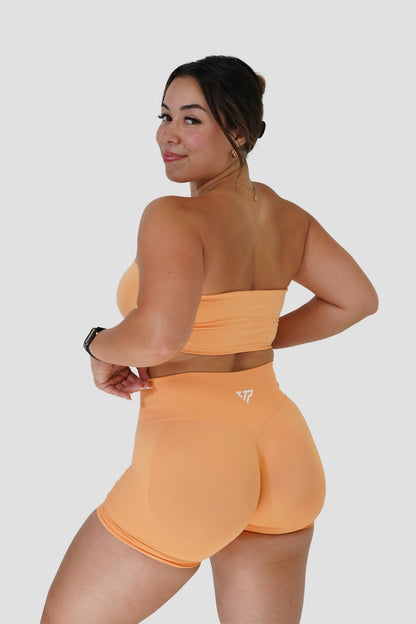 RECOIL HIGH WAIST SCRUNCH SHORTS - ORANGE SHERBET